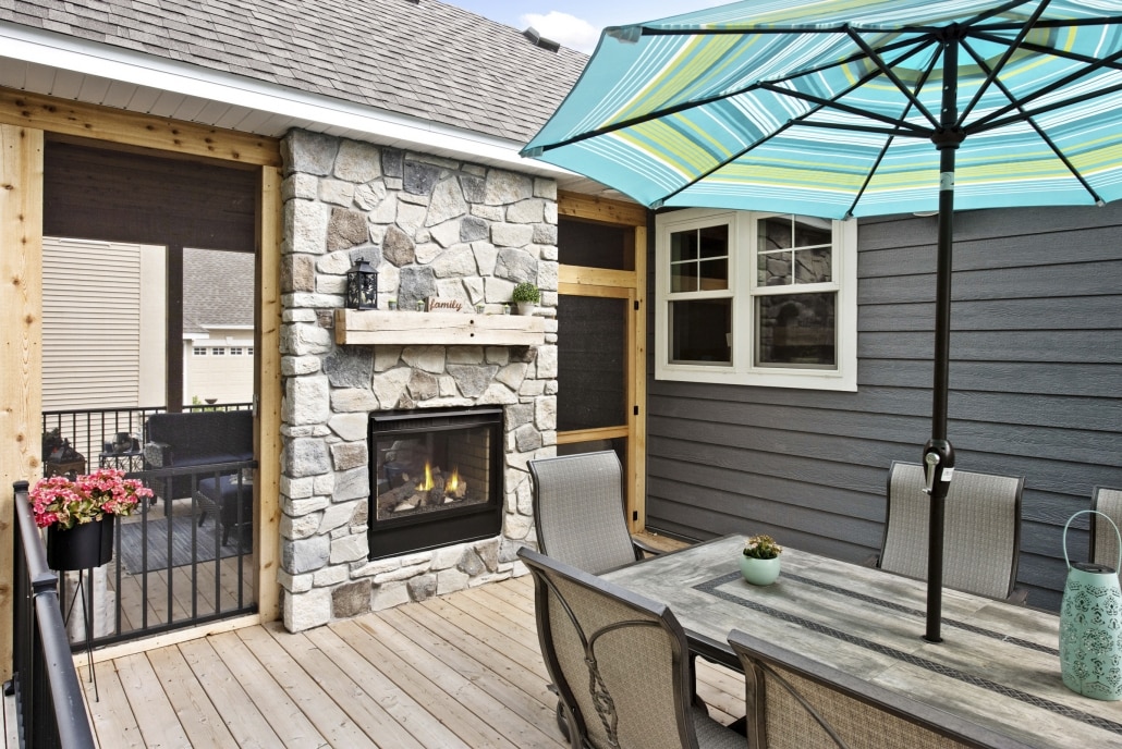 Gas Fireplaces are a great option between a porch and deck. 