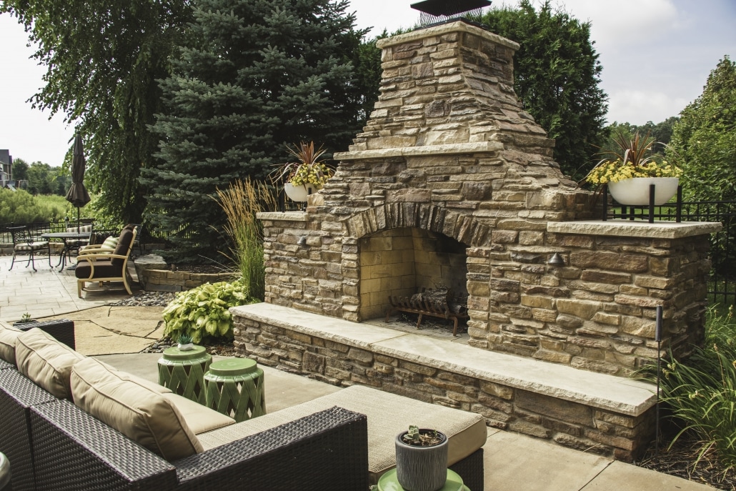 The custom masonry on this outdoor fireplace make it a one of a kind Landscapes Unlimited creation. 
