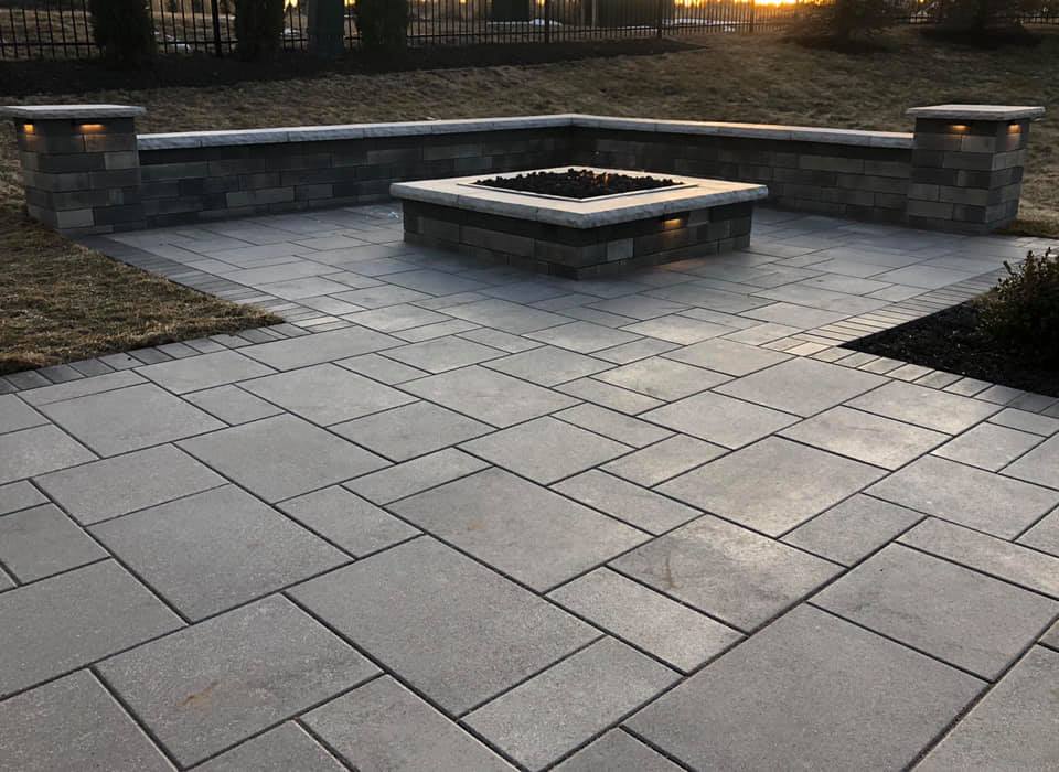A beautiful random pattern with border on this paver patio.