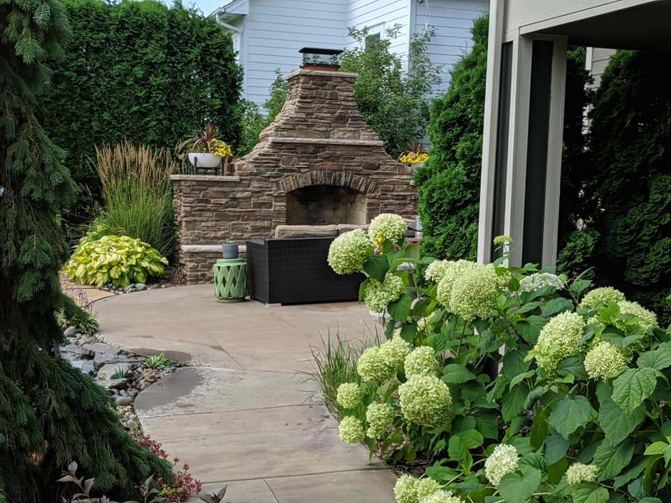 Soft, smooth, coarse, and bulky textures all come into play in this patio design.