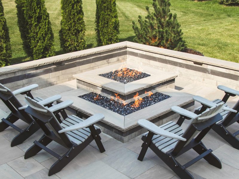 Landscaping design with patio and firepit pavers